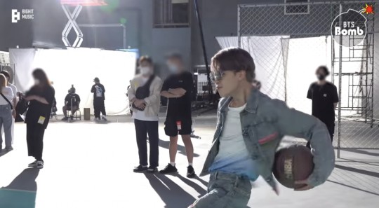 BTS Jimin swirling the ball around his waist