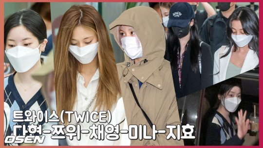 TWICE members upon their arrival at the airport