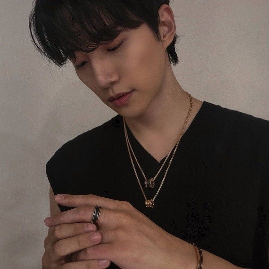 2PM Junho Lee while looking down