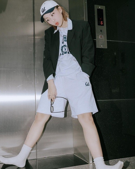 Youngji Lee wearing a cap