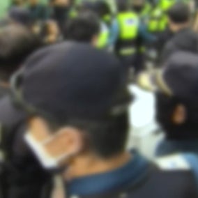 '개표소 경찰 폭행' 20대 남성들 곧 구속 심사