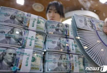 우리은행 "美 파월 양적 긴축 종료 시사…환율 1430원 하회 시도"