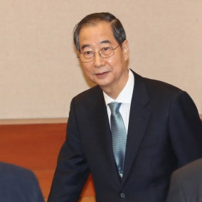 Prime Minister Han apologizes but denies involvement in martial law decree